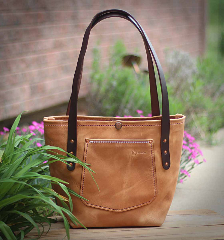 The Forest Run Pasha Purse features Horween English Tan Dublin Light Natural Dublin leather with Wickett and Craig Dark Brown English Bridle straps. Completely handmade in our studio to provide a lifetime of use! The gorgeous bag you deserve!